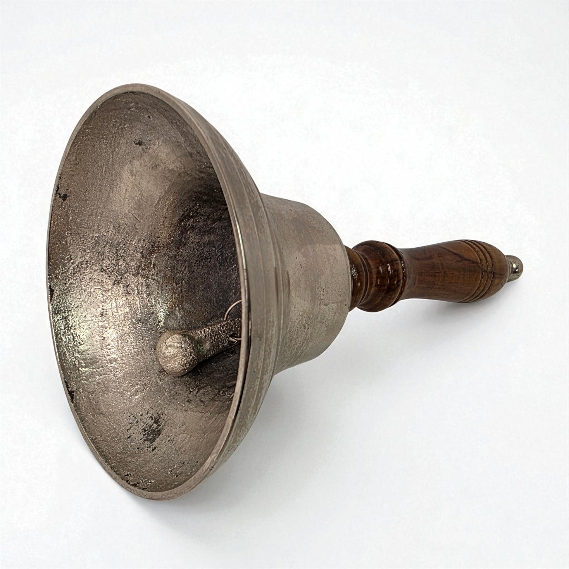 Vintage metal funnel with wooden handle on a white background
