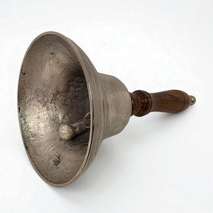 Vintage metal funnel with wooden handle on a white background
