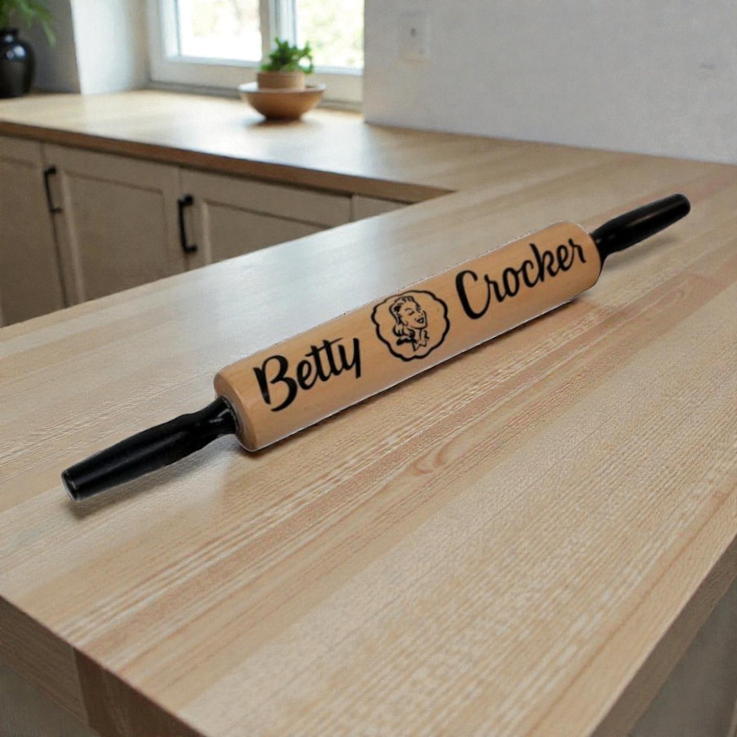 Wooden rolling pin with 'Betty Crocker' branding on a kitchen counter.