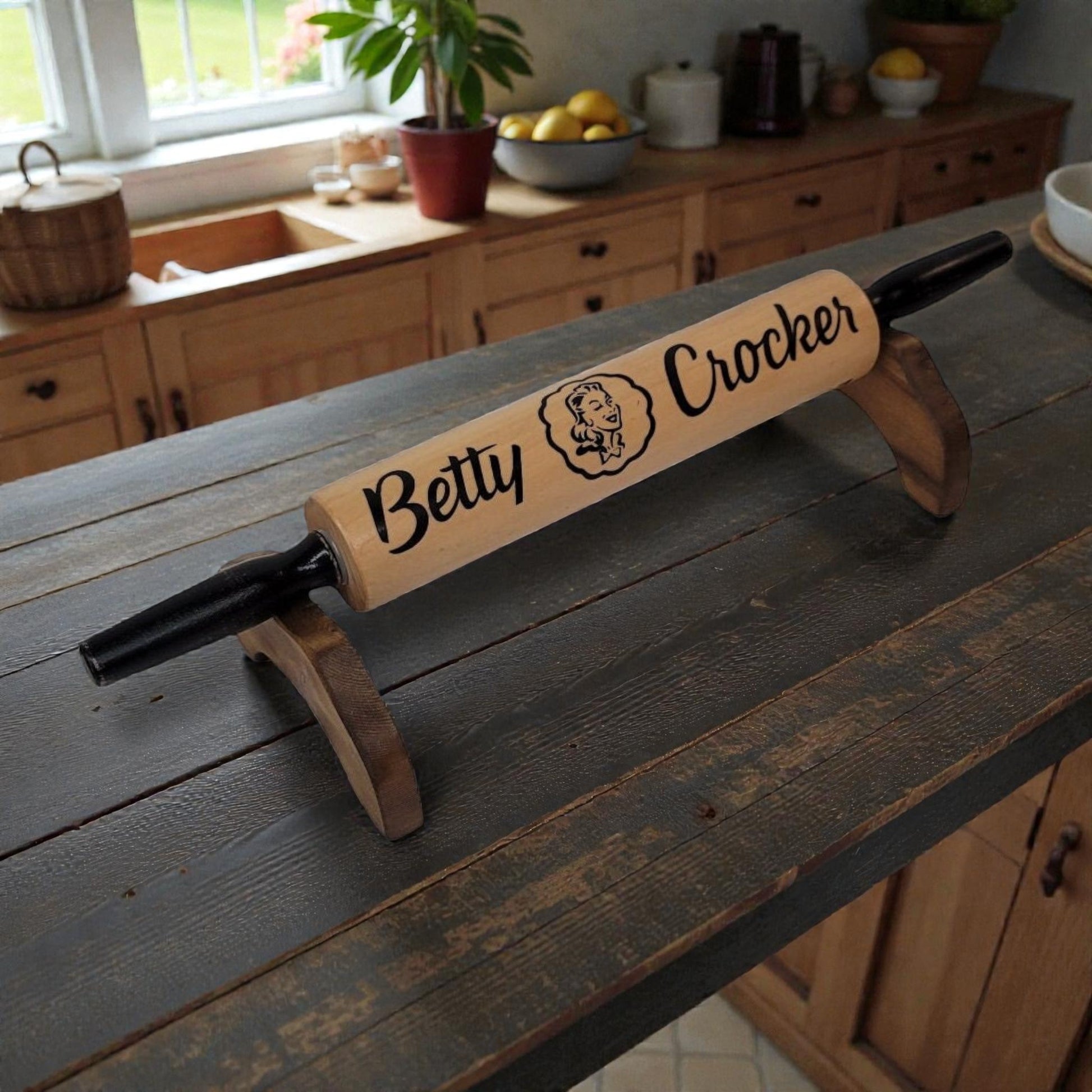 Wooden rolling pin with 'Betty Crocker' branding on a kitchen counter.