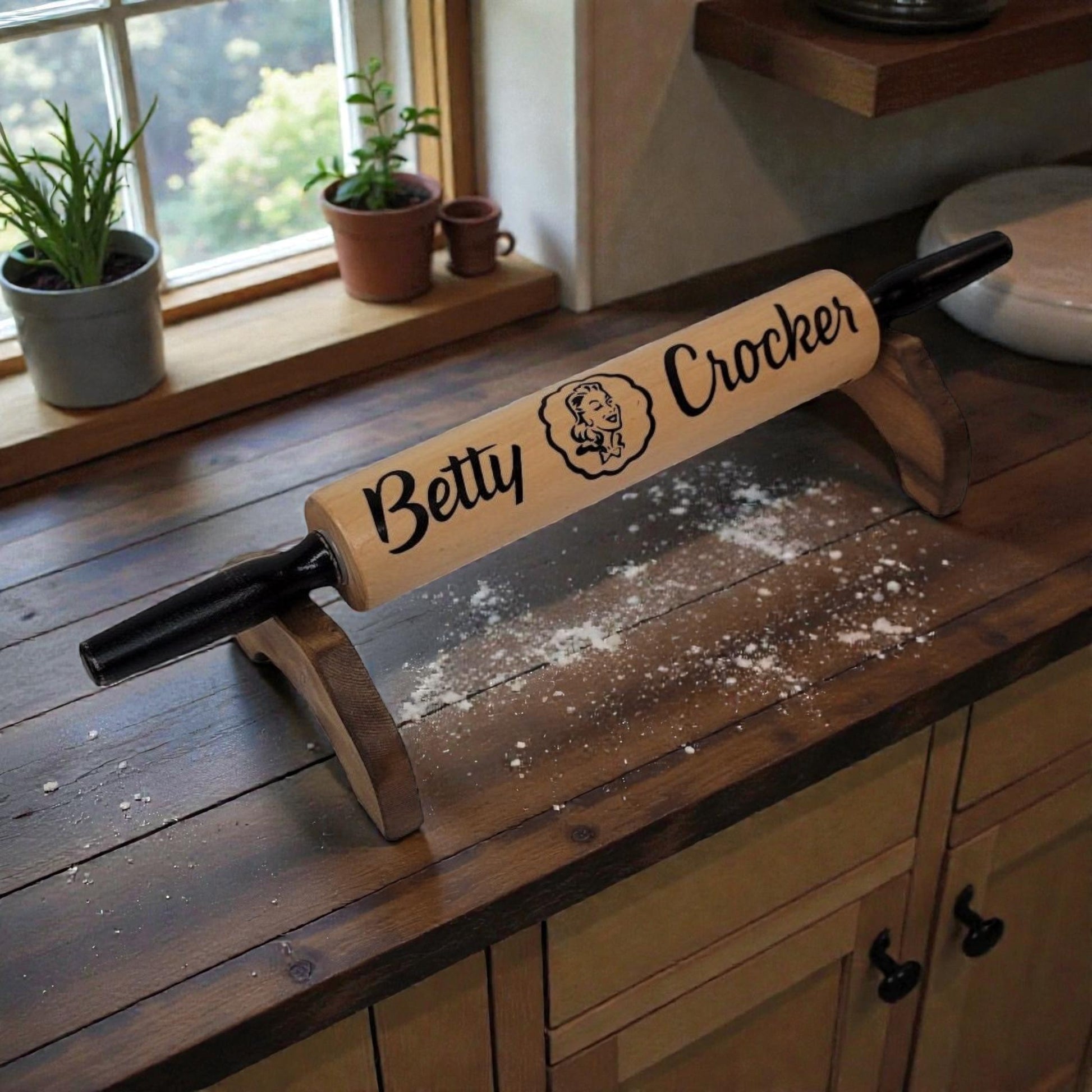 Wooden rolling pin with 'Betty Crocker' branding on a wooden surface.