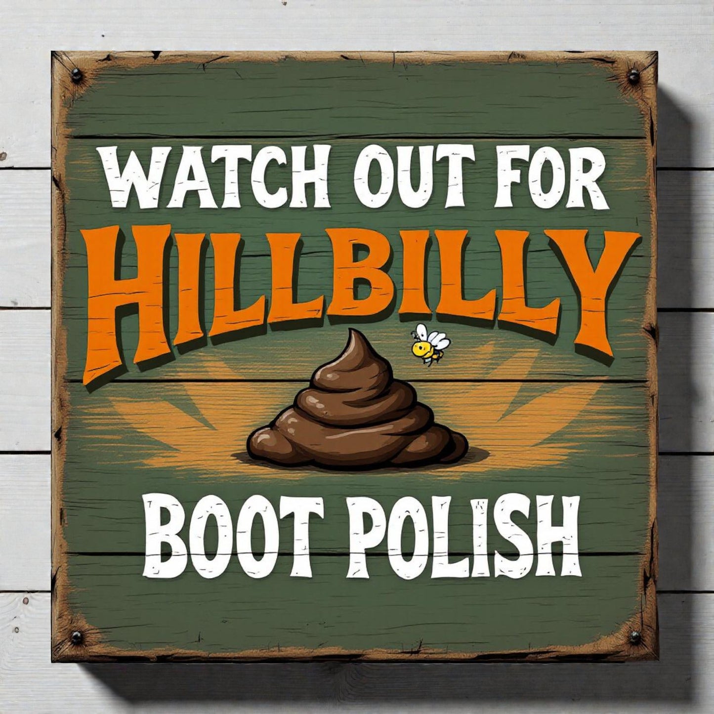 metal sign with humorous text and graphic of a poop emoji on a wooden background