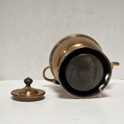 Ornate Victorian copper and brass teapot with ebonized handle
