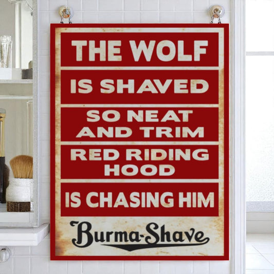 Vintage-style sign with text about 'The Wolf' and 'Red Riding Hood' from Burma-Shave brand, displayed in a bathroom.