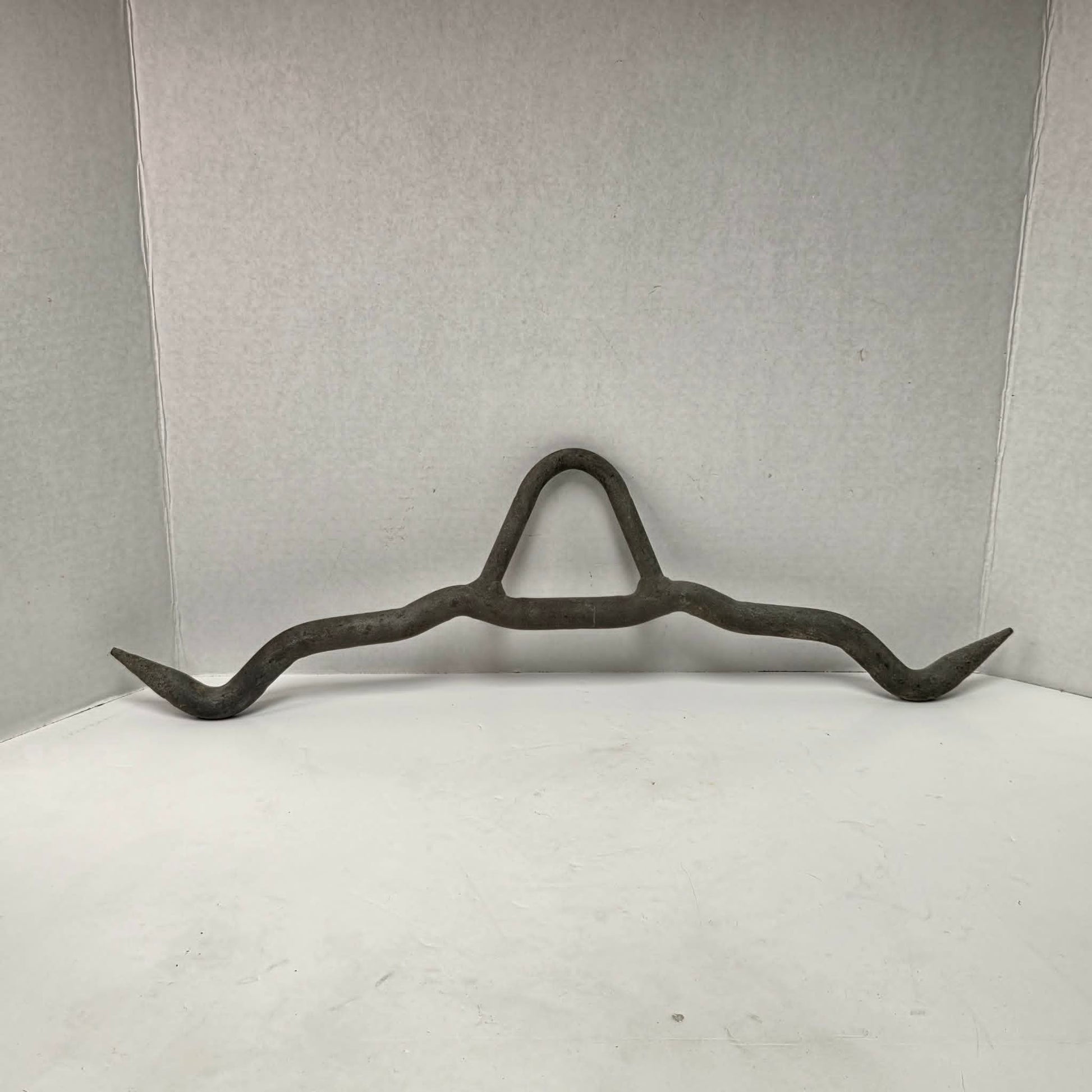 Heavy-duty professional butcher's gambrel hook for hanging deer, hogs, and large game during processing.
