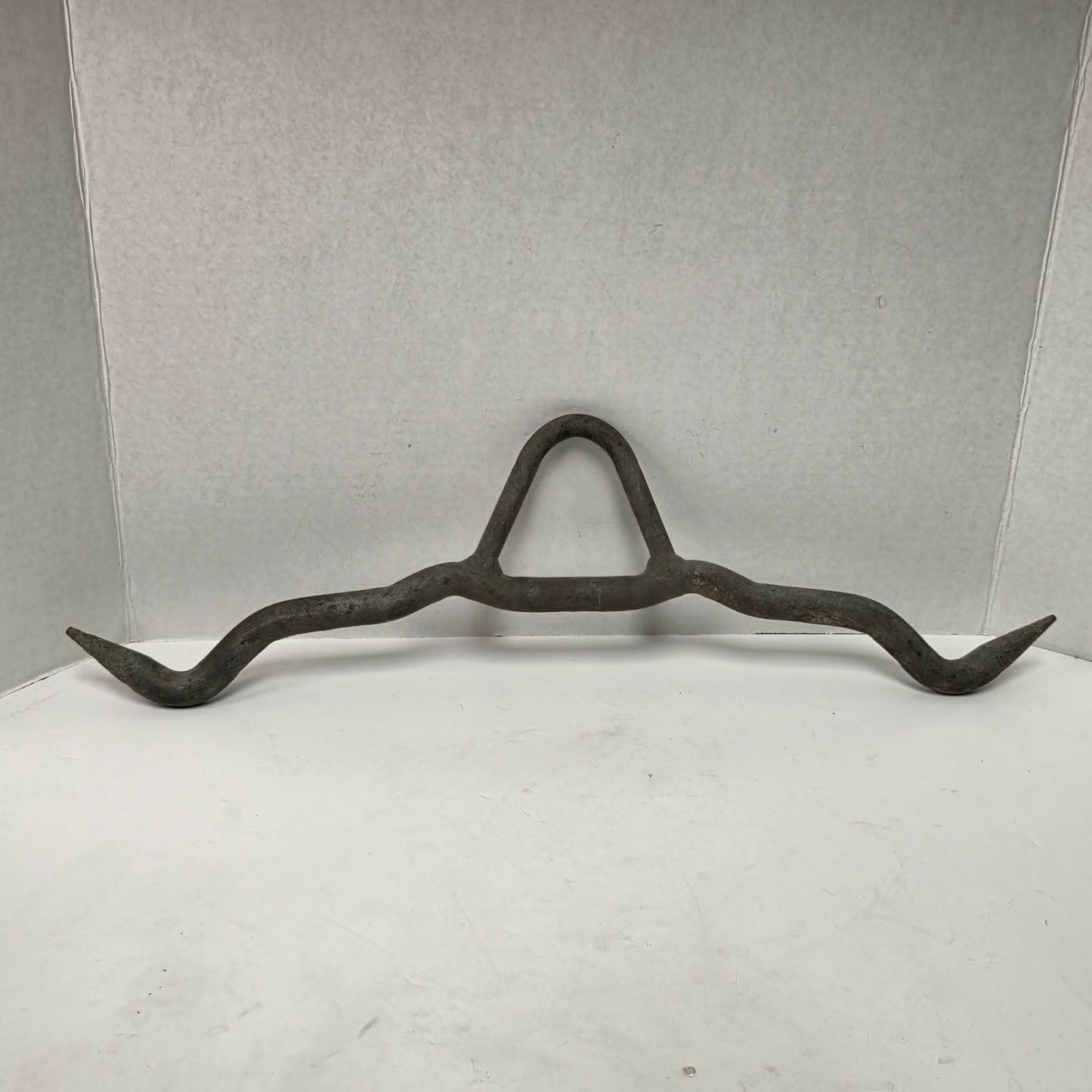 Heavy-duty professional butcher's gambrel hook for hanging deer, hogs, and large game during processing.
