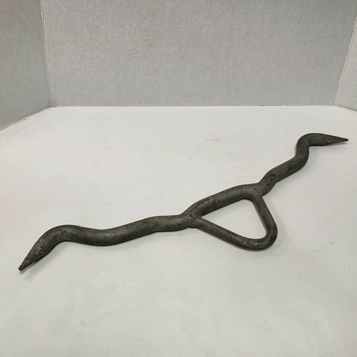 Heavy-duty professional butcher's gambrel hook for hanging deer, hogs, and large game during processing.
