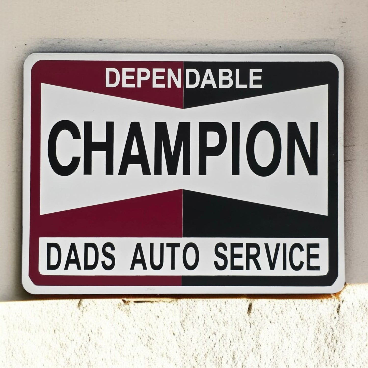 Metal sign with 'Dependable Champion Dads Auto Service' text on a white background