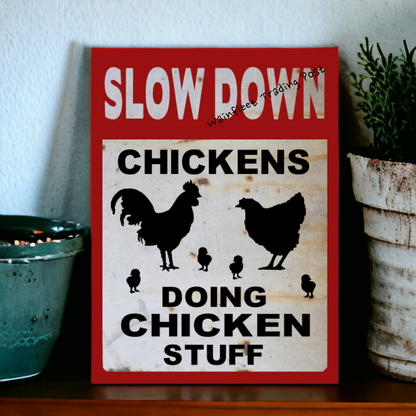 slow down sign chickens doing chicken stuff