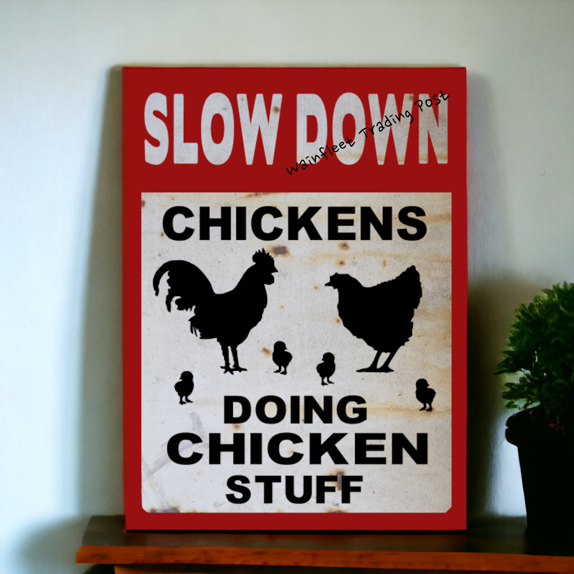 slow down sign chickens doing chicken stuff