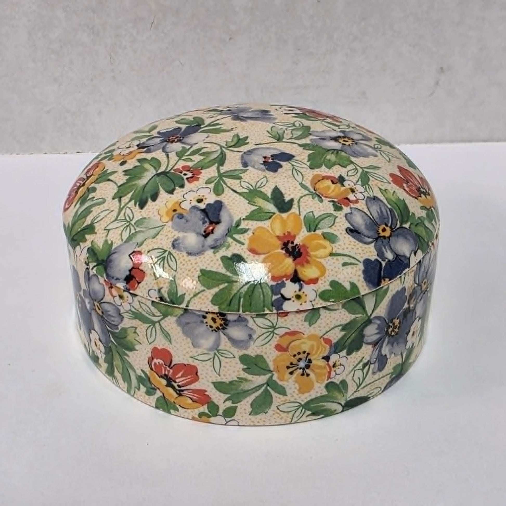 Antique English Chintz porcelain powder jar with floral design in excellent condition.
