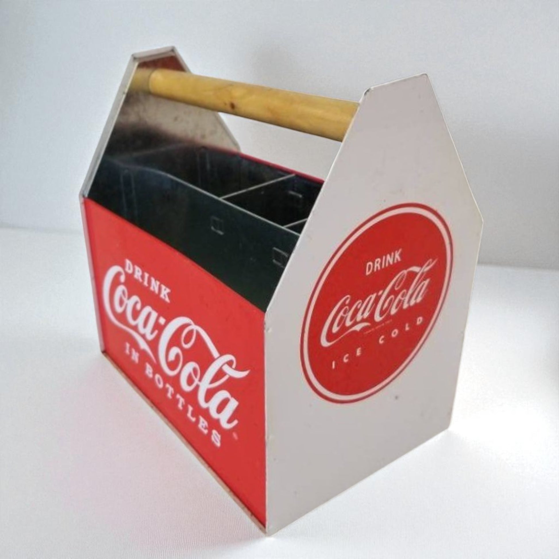 Coca-Cola cooler with wooden handle on a white background