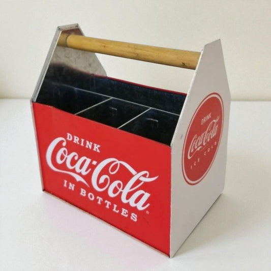 Coca-Cola bottle carrier with wooden handle on a white background