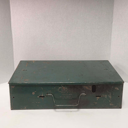Vintage Coleman Model 411 Canadian suitcase camp stove with copper-colored fuel tank.
