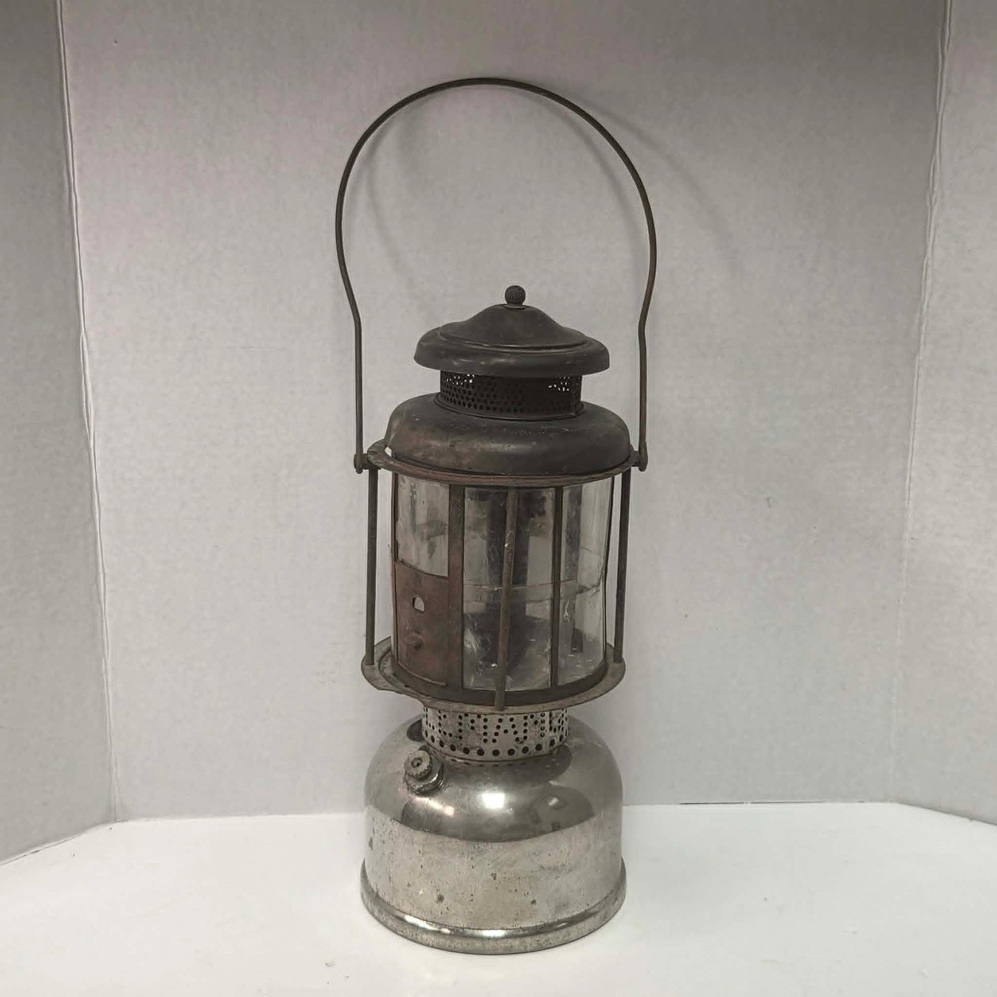 Early 1920s Coleman Model LQ Quick-Lite lantern with mica shade made in Toronto Canada.
