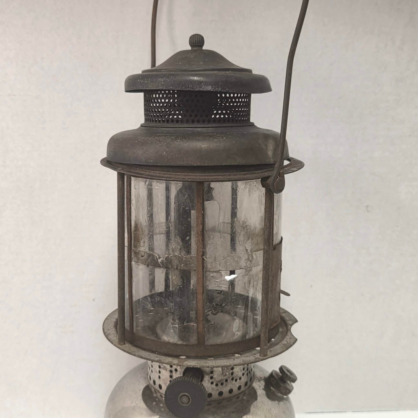 Early 1920s Coleman Model LQ Quick-Lite lantern with mica shade made in Toronto Canada.
