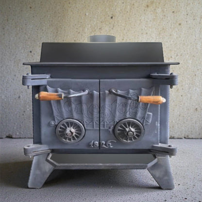 Vintage Conestogo gray metal stove with wooden handles on a neutral background
