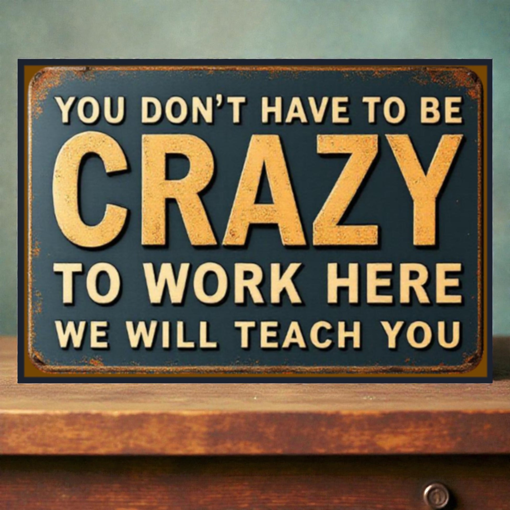 Vintage-style sign with motivational text on a wooden surface