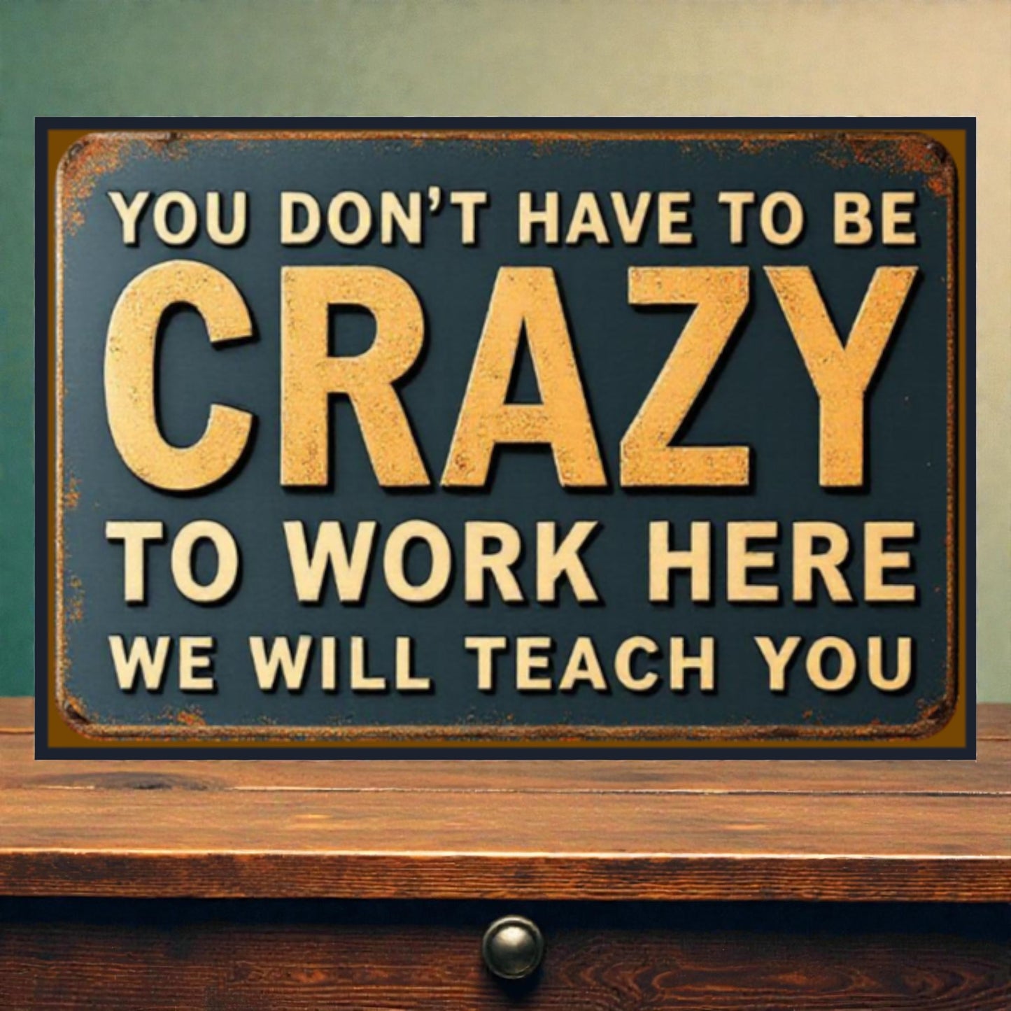 Vintage-style sign with motivational text on a wooden surface