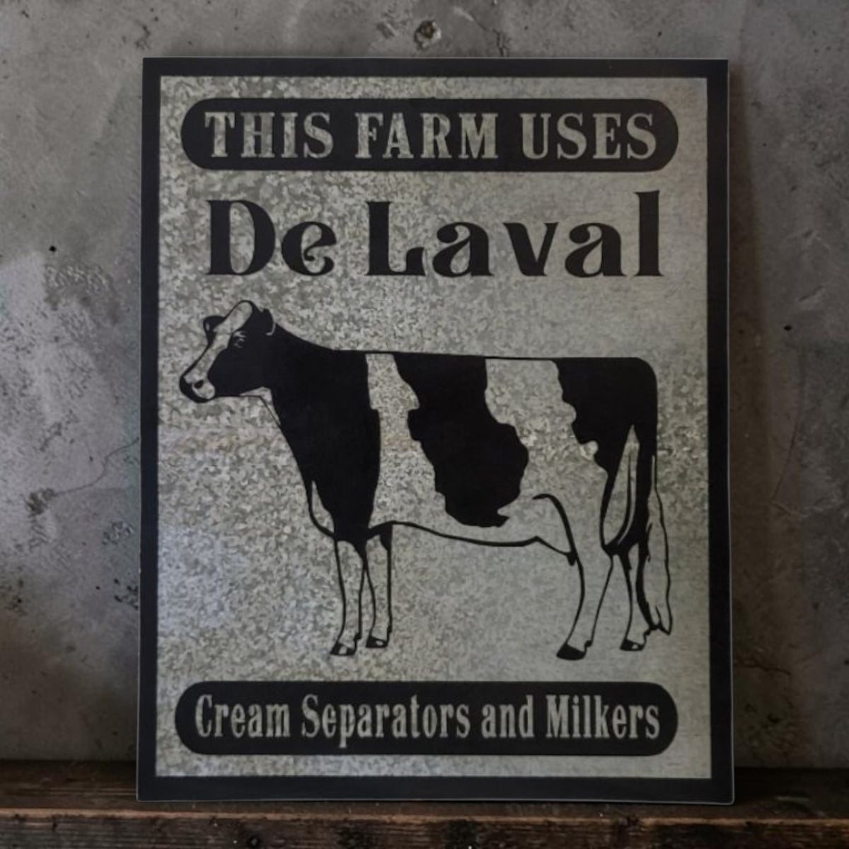 Rustic DeLaval Cream Separators and Milkers farm sign made from reclaimed galvanized barn tin.
