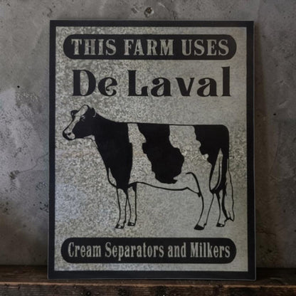 Rustic DeLaval Cream Separators and Milkers farm sign made from reclaimed galvanized barn tin.

