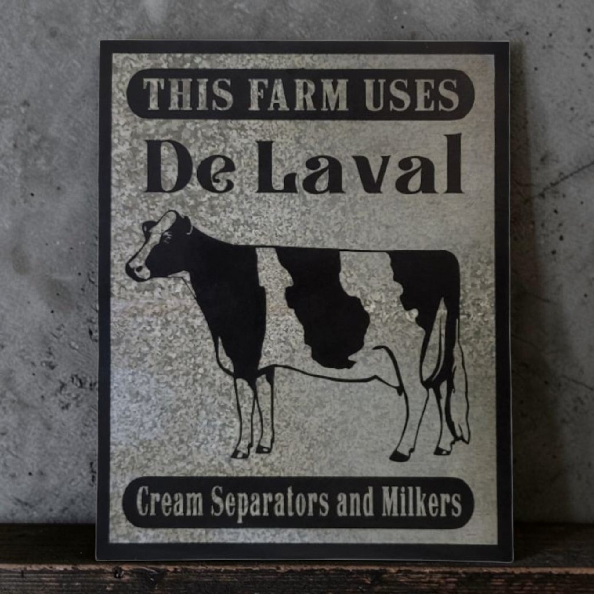 Rustic DeLaval Cream Separators and Milkers farm sign made from reclaimed galvanized barn tin.

