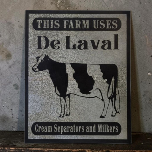 Rustic DeLaval Cream Separators and Milkers farm sign made from reclaimed galvanized barn tin.
