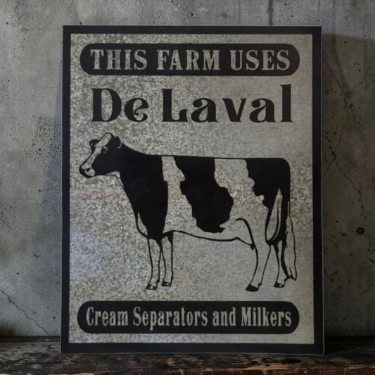 Rustic DeLaval Cream Separators and Milkers farm sign made from reclaimed galvanized barn tin.
