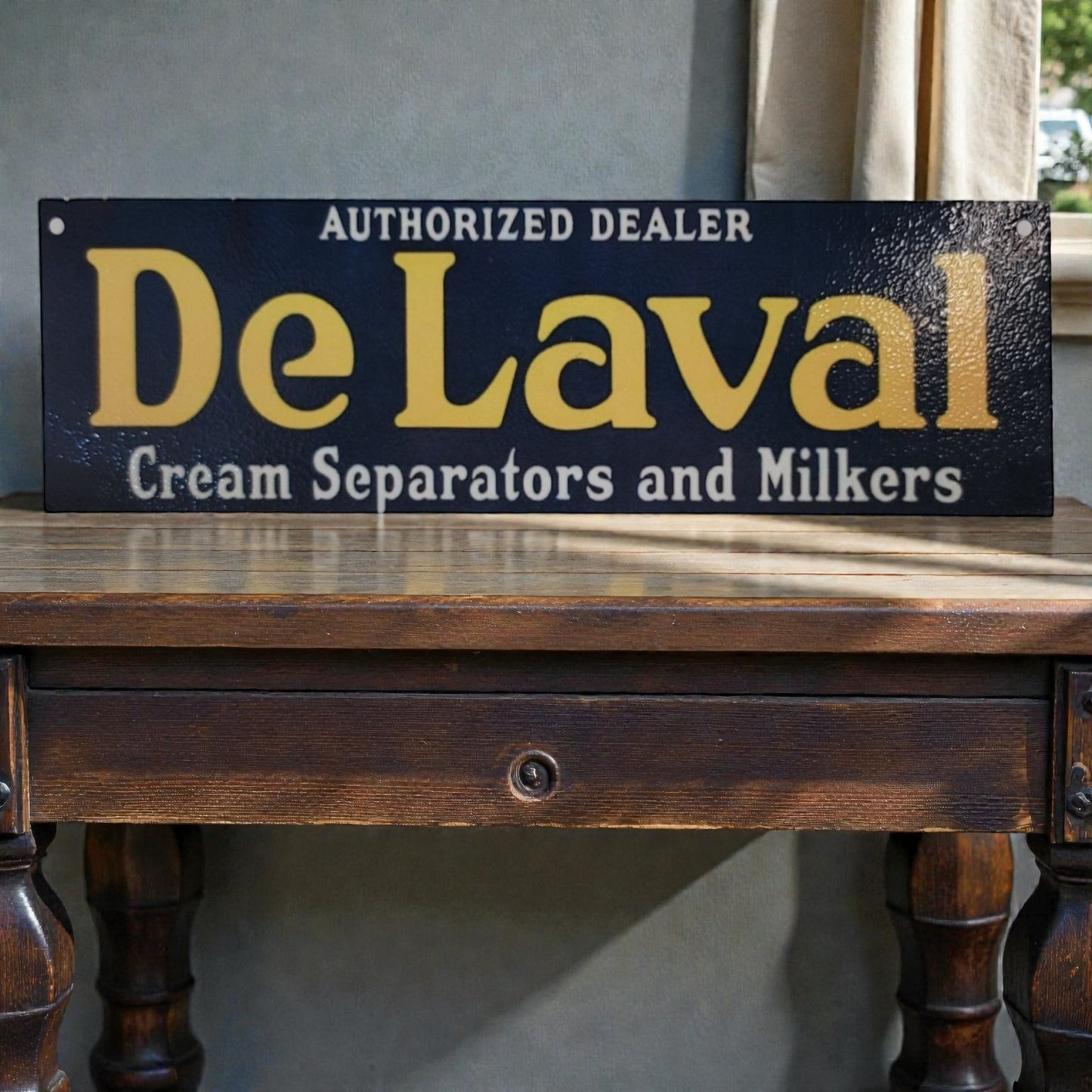 DeLaval sign on a wooden surface with a neutral background