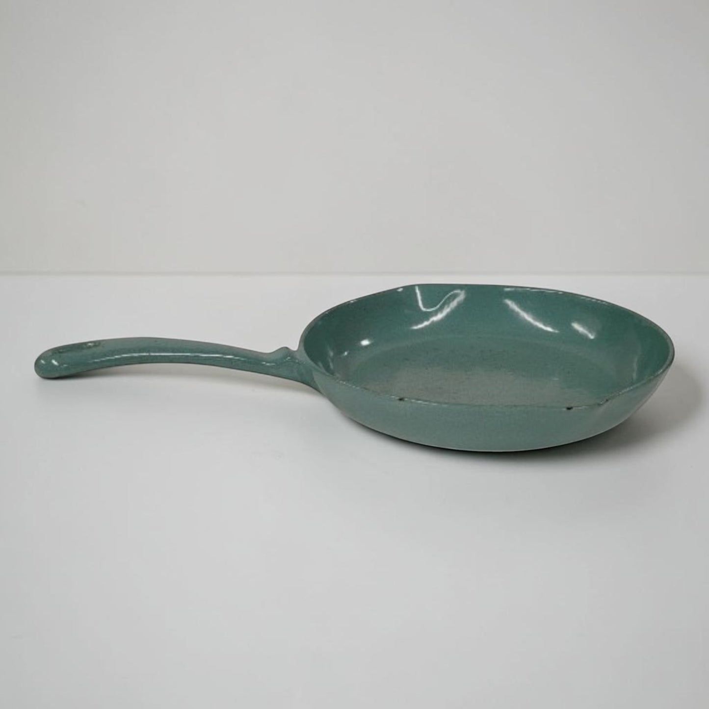 Antique Findlay Ironware No. 9 green enameled cast iron frying pan made in Carlisle Ontario.

