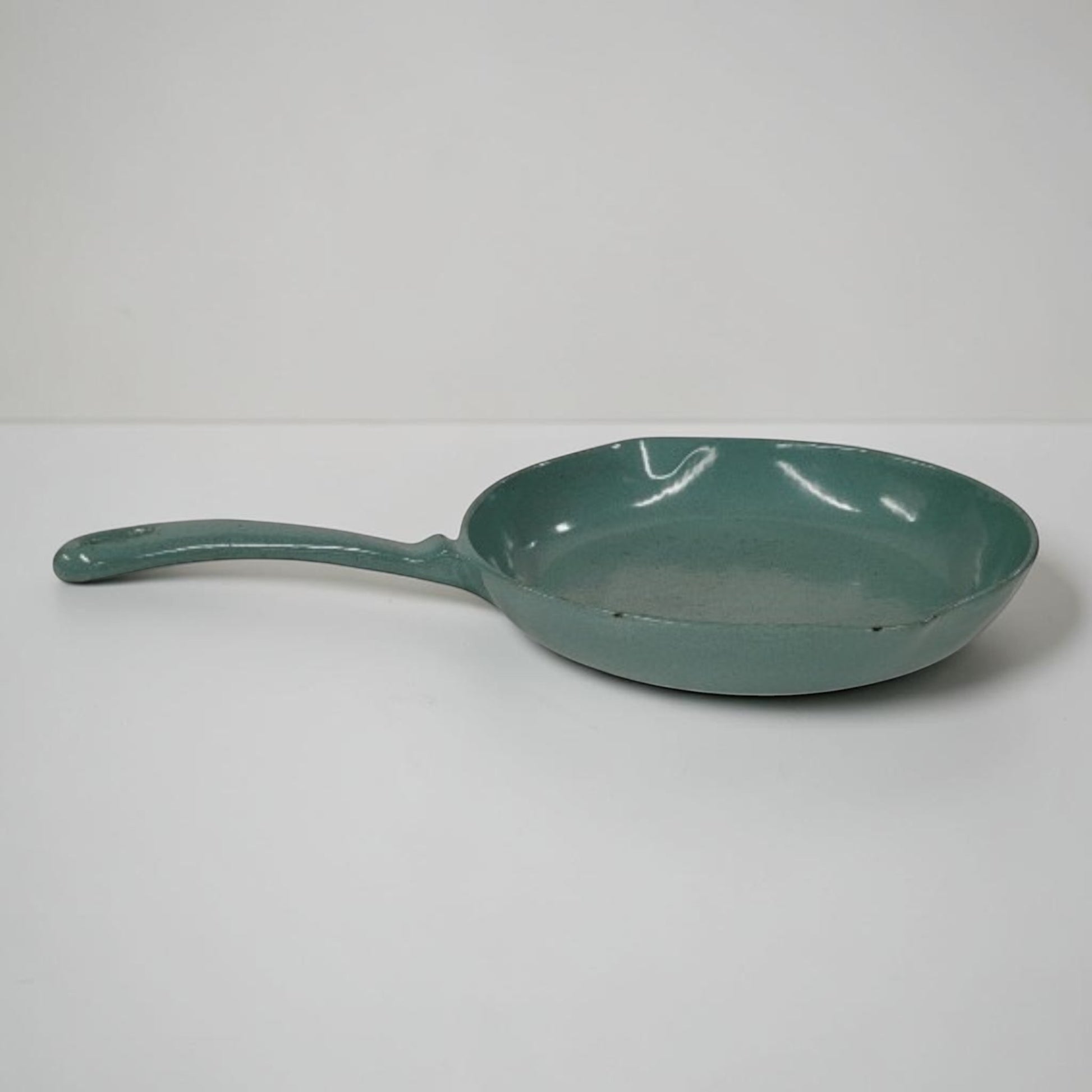 Antique Findlay Ironware No. 9 green enameled cast iron frying pan made in Carlisle Ontario.

