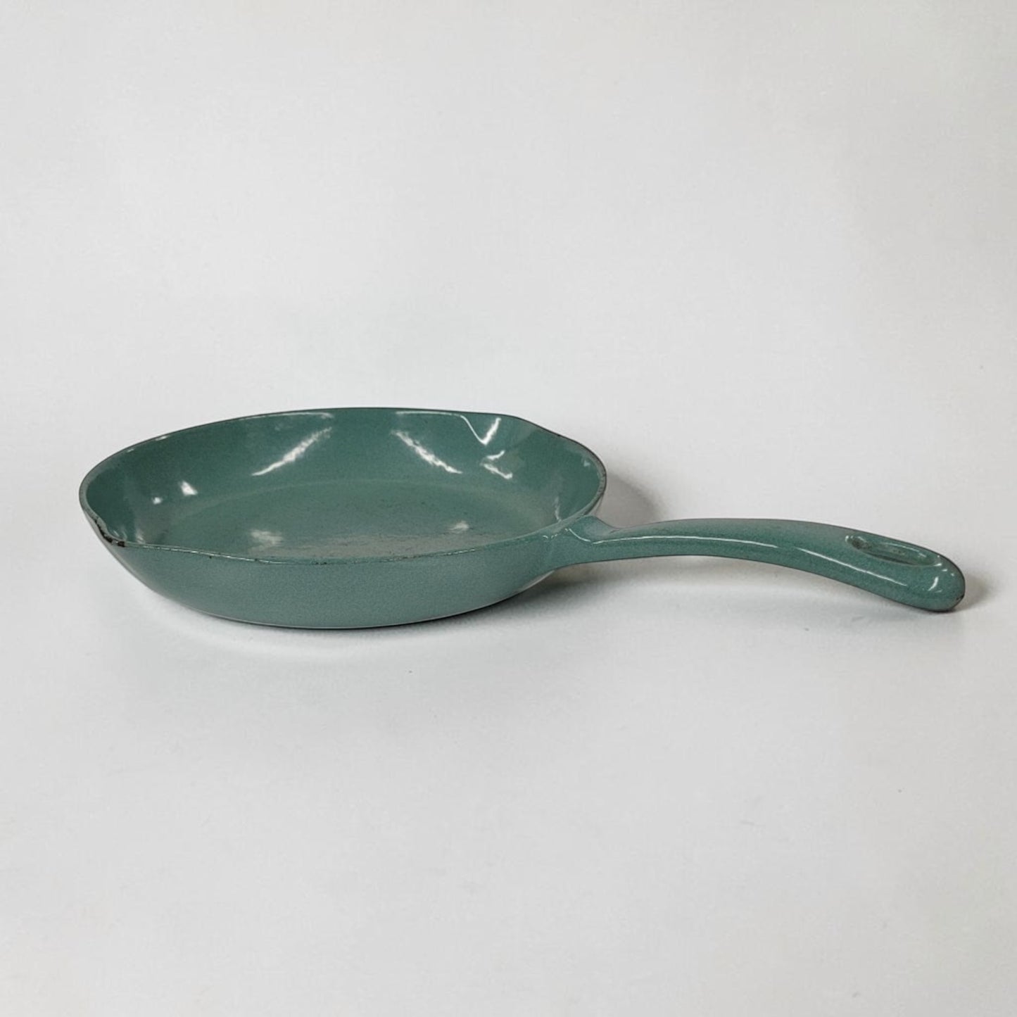 Antique Findlay Ironware No. 9 green enameled cast iron frying pan made in Carlisle Ontario.
