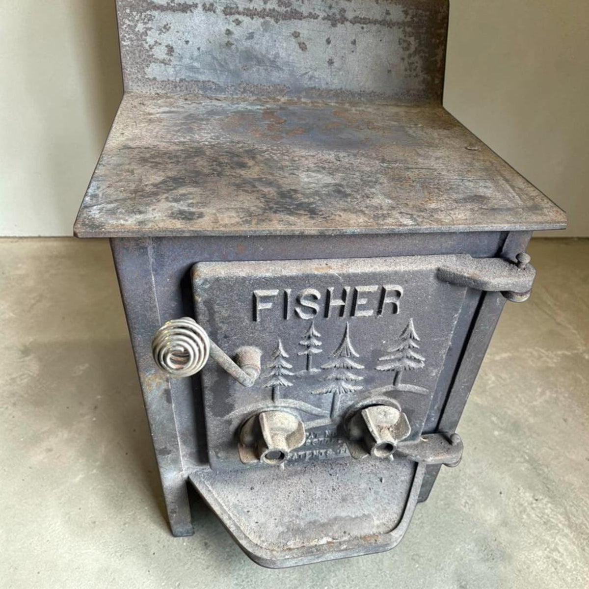 Fisher Papa Bear wood stove with rear vent original baffle and single door
