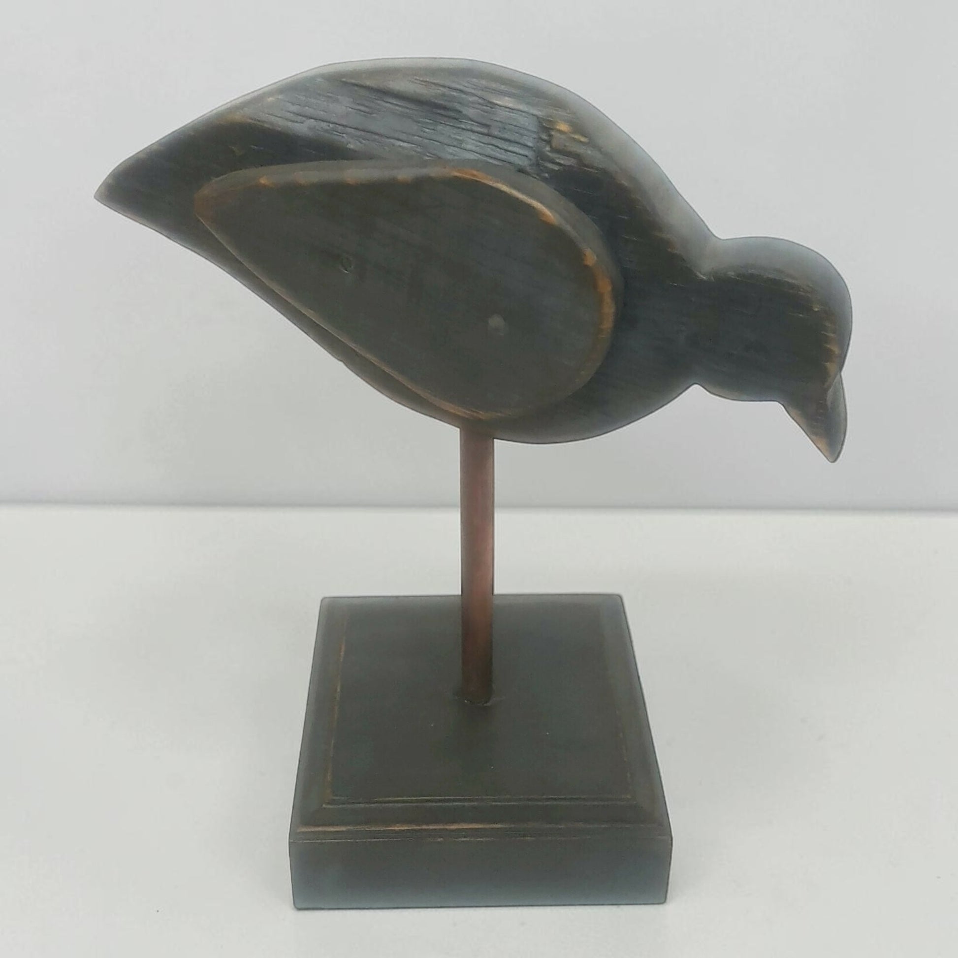 Large folk art bird sculpture with oak base and copper leg for primitive country farmhouse décor.