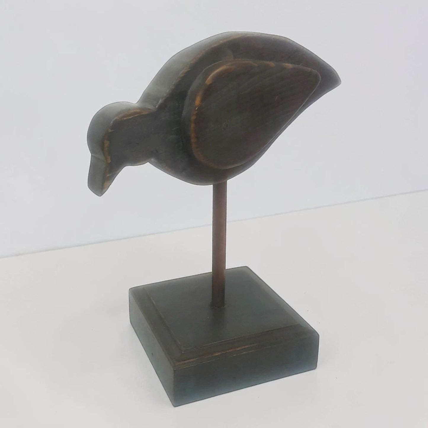 Large folk art bird sculpture with oak base and copper leg for primitive country farmhouse décor.