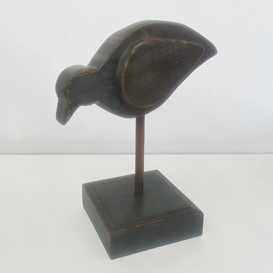 Large folk art bird sculpture with oak base and copper leg for primitive country farmhouse décor.