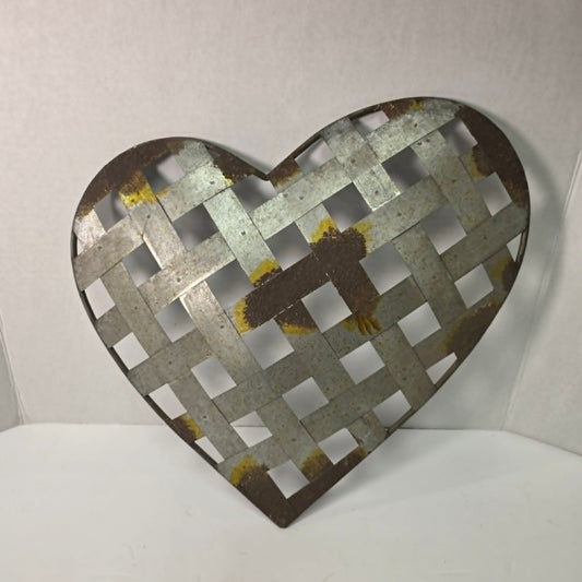 Rustic woven galvanized metal folk art heart wall hanging.