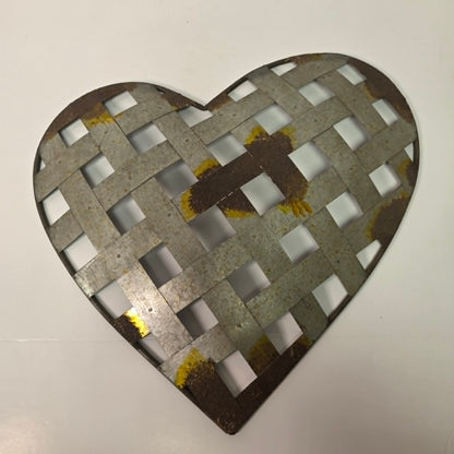 Rustic woven galvanized metal folk art heart wall hanging.