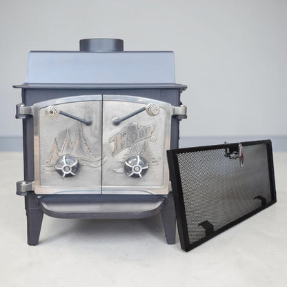 Vintage Fisher Grandma Bear wood stove with full nickel cathedral doors and top chimney vent.
