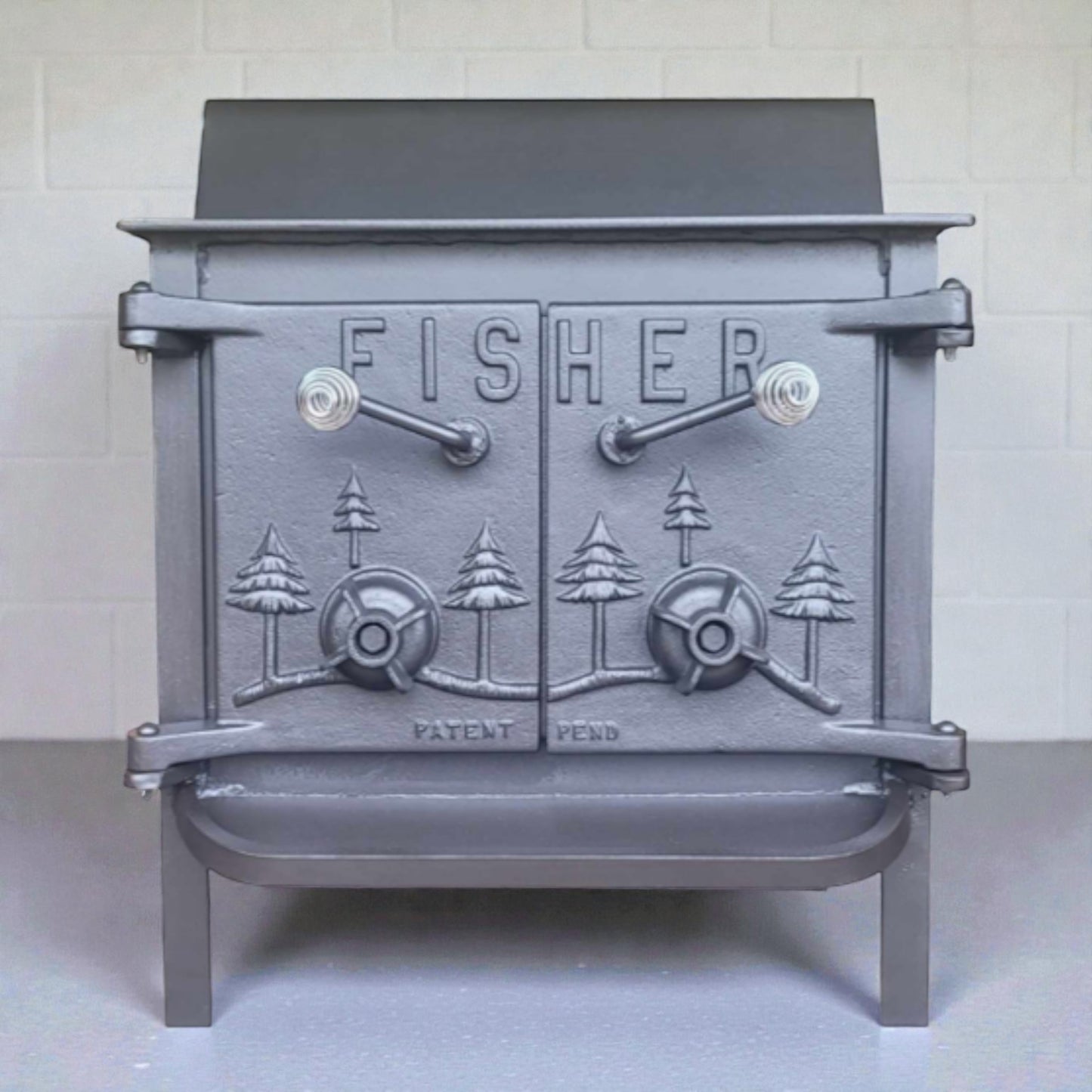 Gray metal stove with 'Fisher' branding on a white background