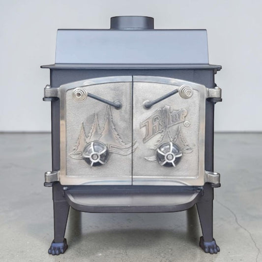 Vintage Fisher Grandma Bear wood stove with full nickel cathedral doors and top chimney vent.

