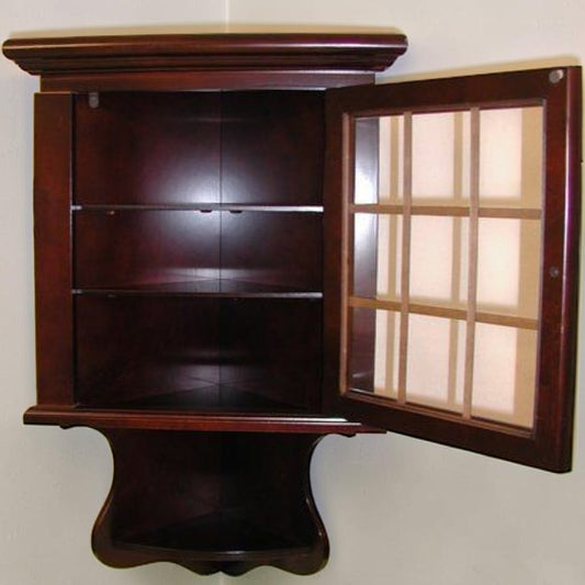 Vintage deep mahogany corner hanging cupboard with glazed glass door, brass teardrop knob, and interior shelves.