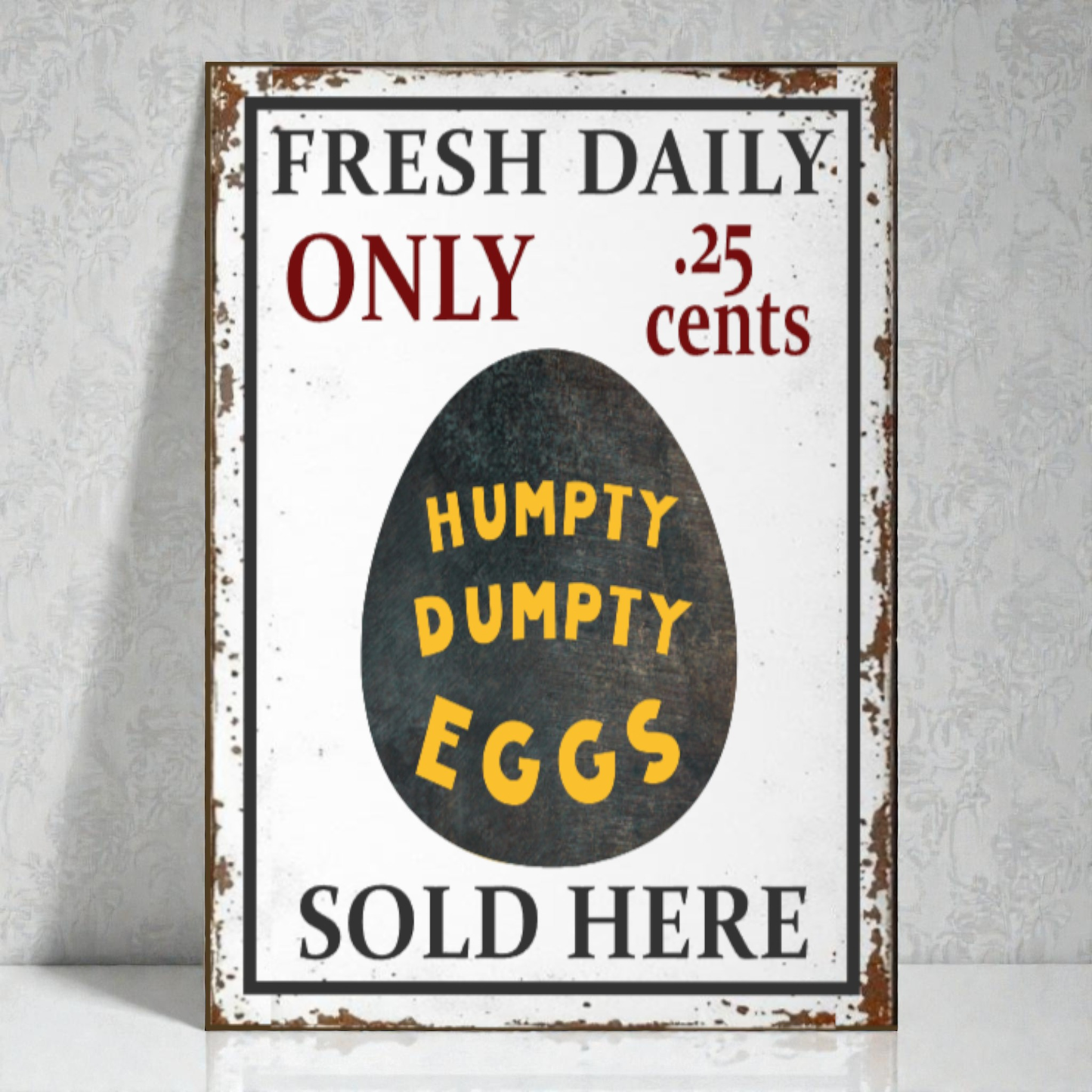 Vintage-style sign advertising 'Humpty Dumpty Eggs' with a black egg graphic on a white background.