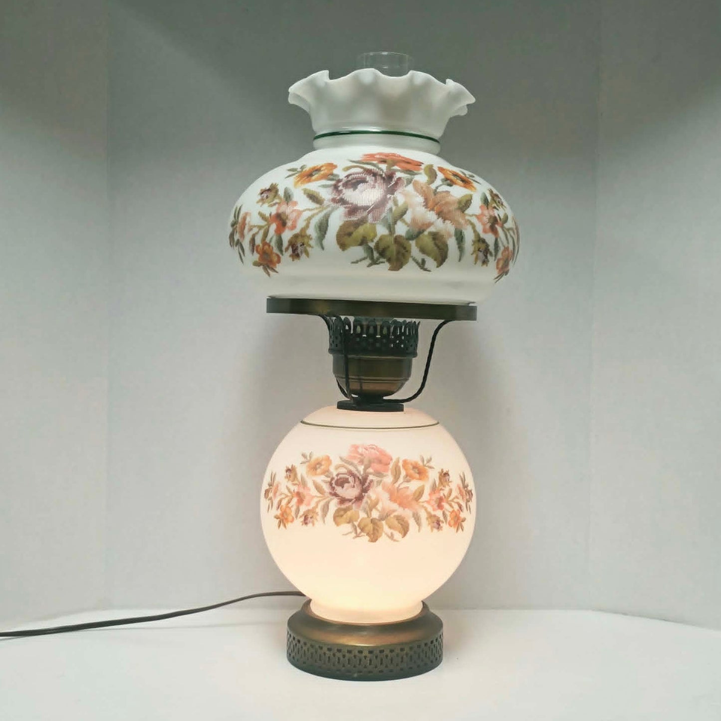 Vintage Gone With The Wind hurricane lamp with floral needlepoint design shade and base, tri-light lamp measuring 21 inches tall.