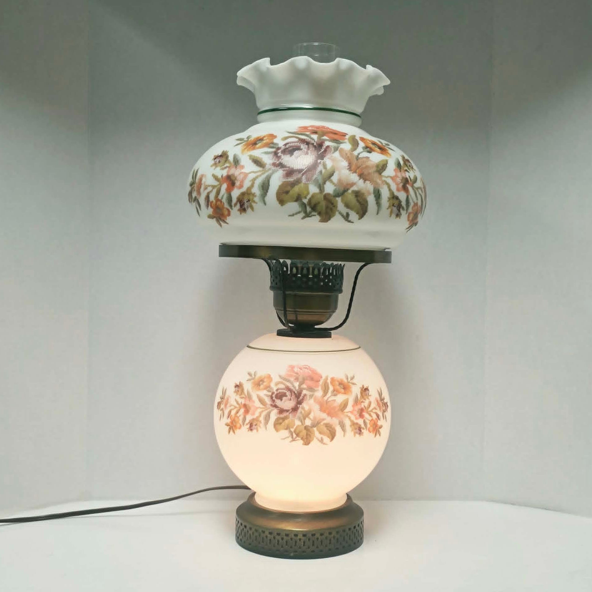 Vintage Gone With The Wind hurricane lamp with floral needlepoint design shade and base, tri-light lamp measuring 21 inches tall.