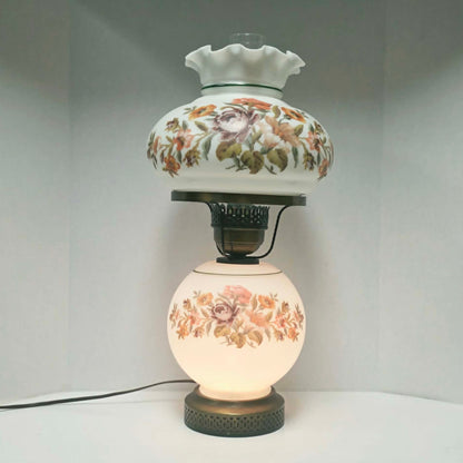 Vintage Gone With The Wind hurricane lamp with floral needlepoint design shade and base, tri-light lamp measuring 21 inches tall.