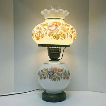 Vintage Gone With The Wind hurricane lamp with floral needlepoint design shade and base, tri-light lamp measuring 21 inches tall.