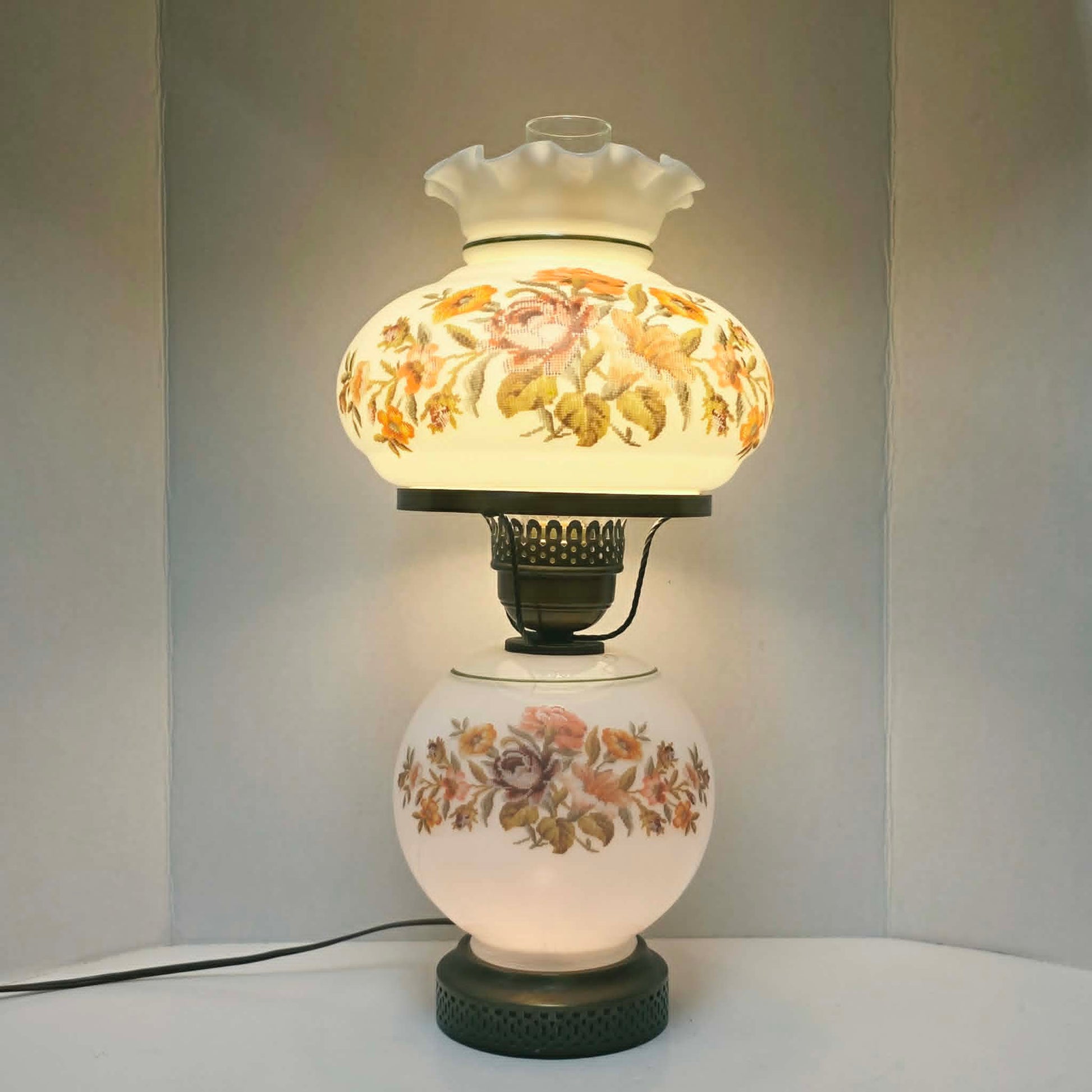 Vintage Gone With The Wind hurricane lamp with floral needlepoint design shade and base, tri-light lamp measuring 21 inches tall.