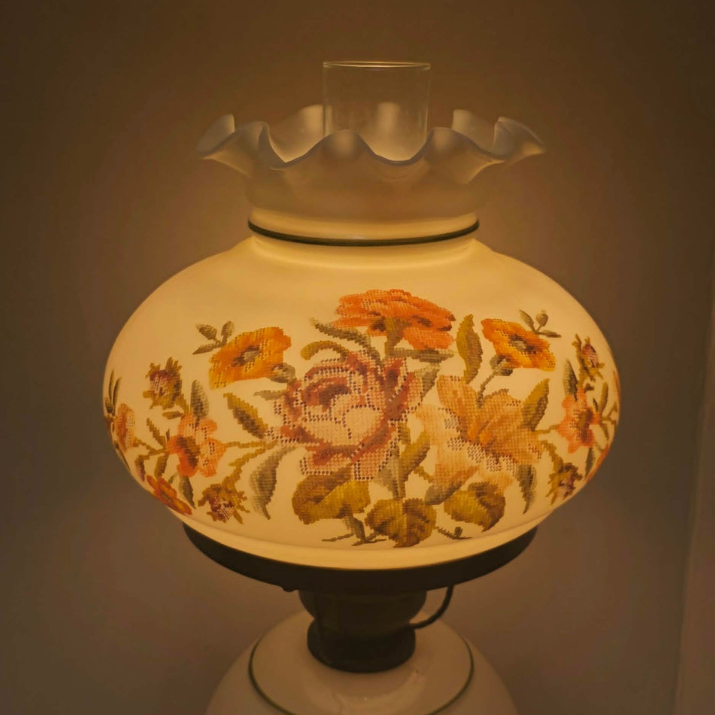 Vintage Gone With The Wind hurricane lamp with floral needlepoint design shade and base, tri-light lamp measuring 21 inches tall.