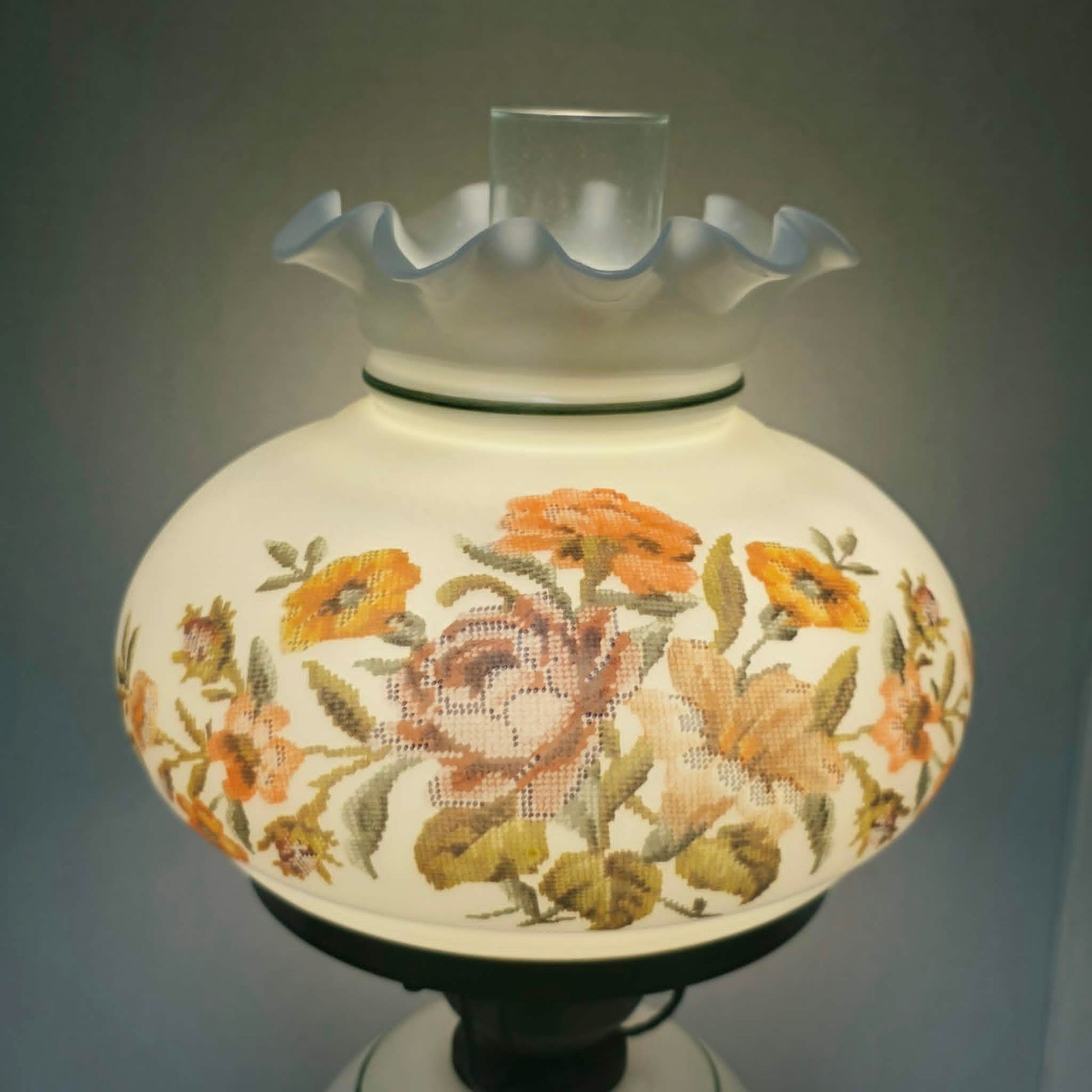 Vintage Gone With The Wind hurricane lamp with floral needlepoint design shade and base, tri-light lamp measuring 21 inches tall.